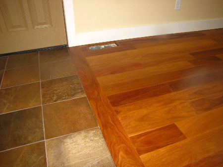 Same wood floor as above, installed and finished by Labrador, along with the slate entry tiles.